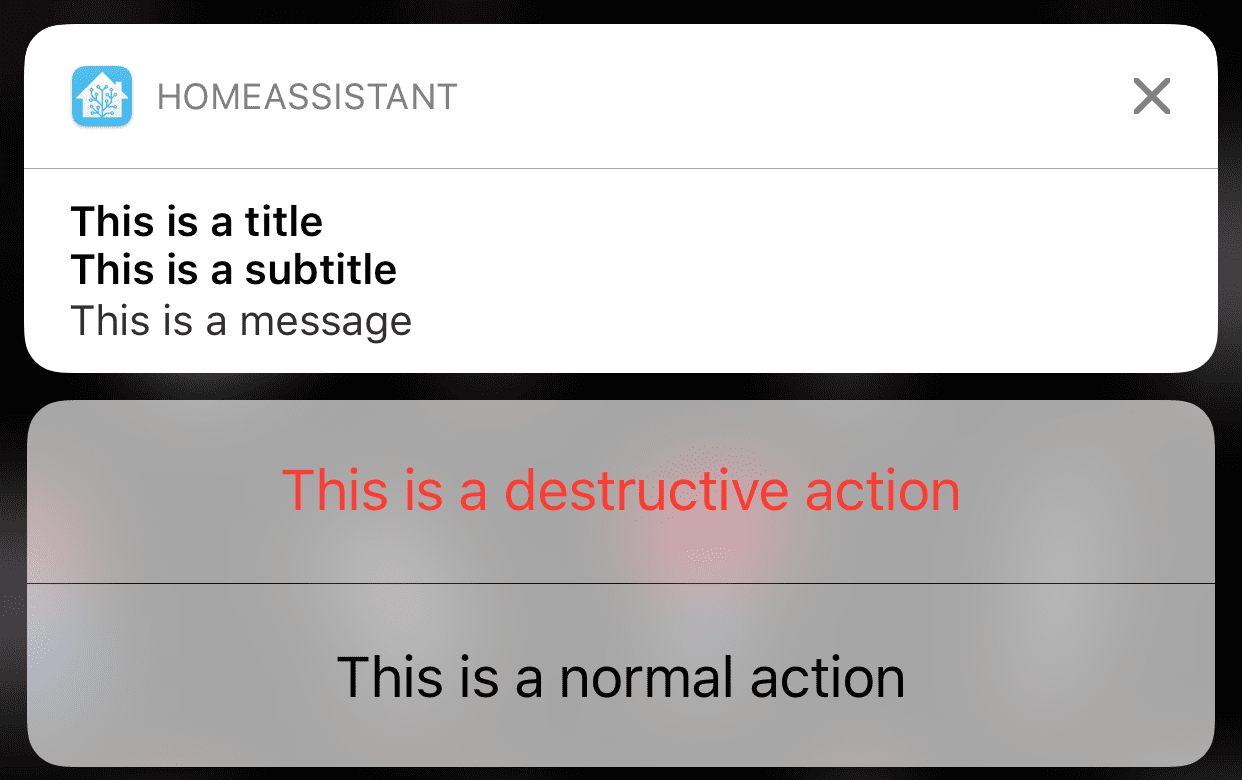A push notification showing all of the basic options `title` and `message` as well as `subtitle` and actions.